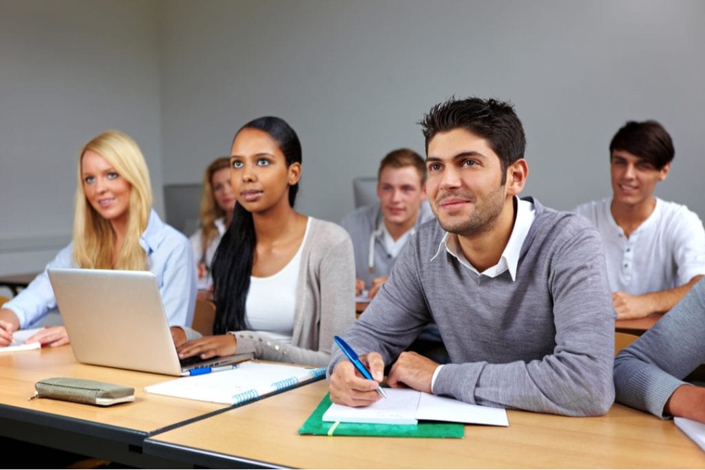Student attentively listening to their teacher